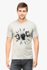 A person wearing the Premium Fitness T-Shirt by Looga, designed for health and fitness enthusiasts, with a graphic of a hand holding a dumbbell surrounded by rays, set against a plain white background.