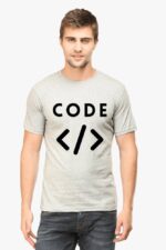 A man wearing the Premium Classic T-Shirt for Techies, featuring the word CODE and HTML tags printed in black on a gray background, stands against a plain white backdrop, embodying a calm and minimalist vibe that echoes the modern LOOGA aesthetic.
