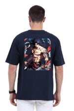 A man with short hair stands with his back to the viewer, wearing a navy blue T-shirt. The shirt showcases a dynamic, Looga-inspired anime-style illustration of a muscular character with long dark hair and tattoos, surrounded by swirling elements.