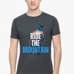 A smiling South Asian model with short hair, wearing a comfortable round neck Adventure T-Shirt in a neutral color