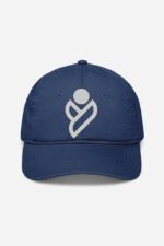 A unisex navy blue baseball cap from the "Looga" collection, featuring a silver abstract logo with a stylized geometric design combining circular and angular elements on the front. It comes with a curved brim and is set against a plain white background. Designed as the perfect baseball cap for both men and women.