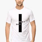 Person wearing a white motivational t shirt featuring a central black rectangle with indistinct motivational text