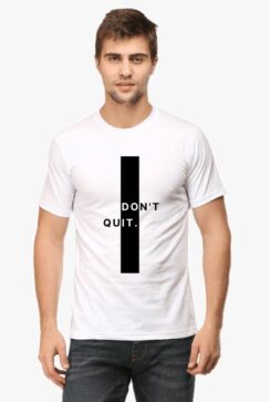 Person wearing a white motivational t shirt featuring a central black rectangle with indistinct motivational text