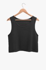 A Plain Color Crop Tank Top for Women in black, elegantly featuring Looga-inspired patterns, hangs on a wooden hanger against a pristine white backdrop.