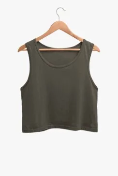 A South Asian woman with long hair, wearing a comfortable and stylish Crop Tank Top for Women in a neutral color