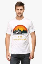 A man wears a Looga Embrace the Journey themed graphic t-shirt for men, featuring a mountain landscape with a jeep, trees, and a sun.