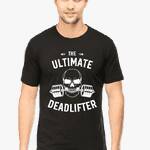 A person showcasing a black fitness t shirt with dynamic white text and graphics