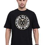 A person showcasing a black over sized t shirt with a striking white circular graphic,