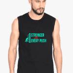 A man sporting a black gym tank top with vibrant green text