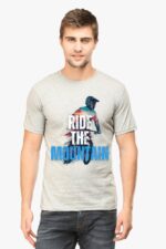 A man with short brown hair wears the gray Looga Adventure T-Shirt for Men: Ultimate Comfort and Style for Explorers. It showcases a cyclist with Ride the Mountain text. He stands against a plain white background, looking directly at the camera.