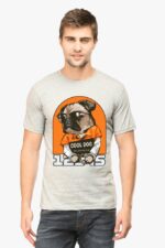 A man with short hair smiles while wearing a Looga Unisex Classic Pet Lovers T-Shirt, showcasing a cartoon pug in sunglasses and an orange shirt labeled COOL DOG, with 1985 below, perfectly capturing his playful style.
