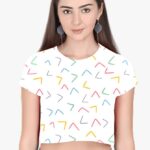 A person sporting a white croptop adorned with colorful miniature figures