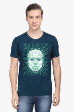 A man in a unisex navy blue T-shirt featuring an AI-inspired digital face design reminiscent of a circuit board, like a Looga dream. He has short hair and stands against a plain white background.