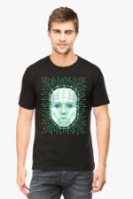A person with short brown hair and a light beard stands against a white background, wearing a black unisex round-neck half-sleeve T-shirt featuring an AI-inspired neon green geometric face and circuit patterns in Looga style.