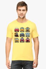 A man showcases a Looga Cartoon Cars T-shirt, featuring cartoon vehicles like a taxi, police car, and fire truck in a grid pattern. With short brown hair, he slightly smiles, posing casually against a plain white backdrop.