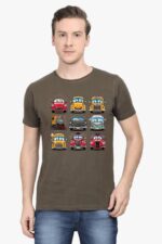 A person with short hair stands against a plain background wearing Loogas Cartoon Cars T-shirt for men and women, featuring green fabric with cartoon cars and trains arranged in a playful grid pattern.
