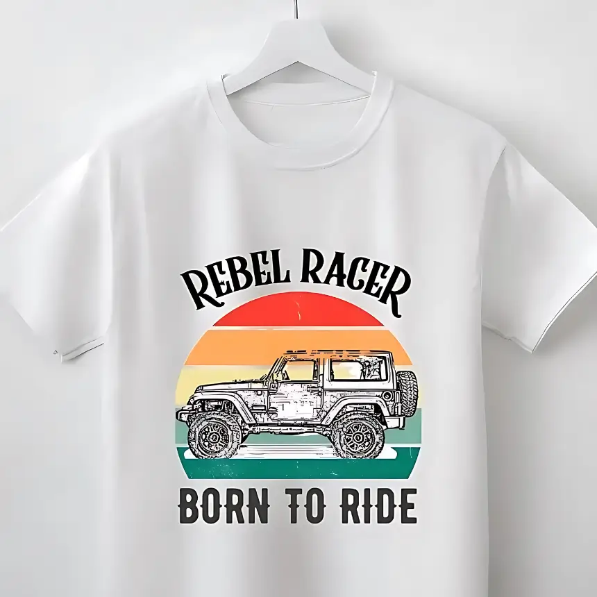 White t-shirt with a ‘REBEL RACER BORN TO RIDE’ design, featuring a vintage car (Mahindra Thar) and sunset