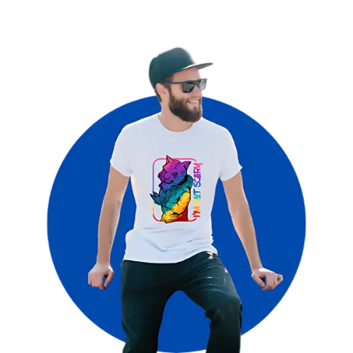 Man in vibrant rainbow-colored bear print t-shirt standing against blue background