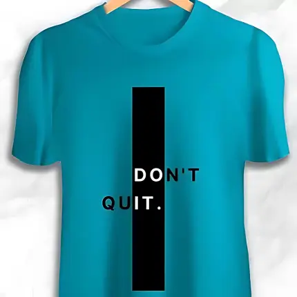 The image is of a turquoise t-shirt with the text “DON’T QUIT” in a black rectangle, cleverly designed to also read as “DO IT”. It’s a motivational T Shirt Design encouraging persistence and action.