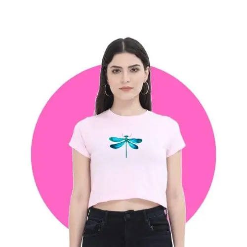 Woman in pink crop top t-shirt against pink background