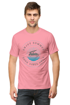 The image shows a person wearing a pink summer t-shirt with a graphic design on the front. The design includes text and an illustration of what appears to be a boat on water.