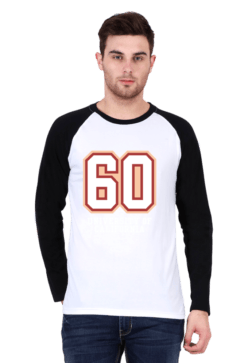 Man wearing a stylish white and black raglan T-shirt with the number 60 printed on it, paired with jeans.
