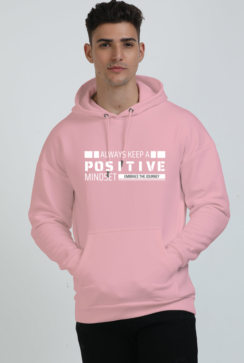 Person wearing a pink hoodie with the text "Always Keep a Positive Mindset" on the front.