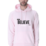 A man wearing a light pink Always Believe in Yourself Hooded Sweatshirt, known for its soft, breathable fabric and style for men and women, exudes calm confidence akin to Loogas serene landscapes.