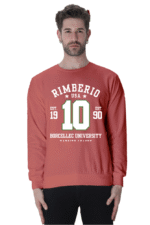 The person is stylishly sporting a unisex Coral sweatshirt, featuring bold white text with the message Rimberio USA, Est. 1990, and Borcellic University, along with a standout number 10 prominently displayed in the center.
