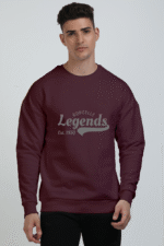 A man models the Maroon oversized sweatshirt, featuring Borcelle Legends Est. 1950 on the front, against a plain white backdrop.