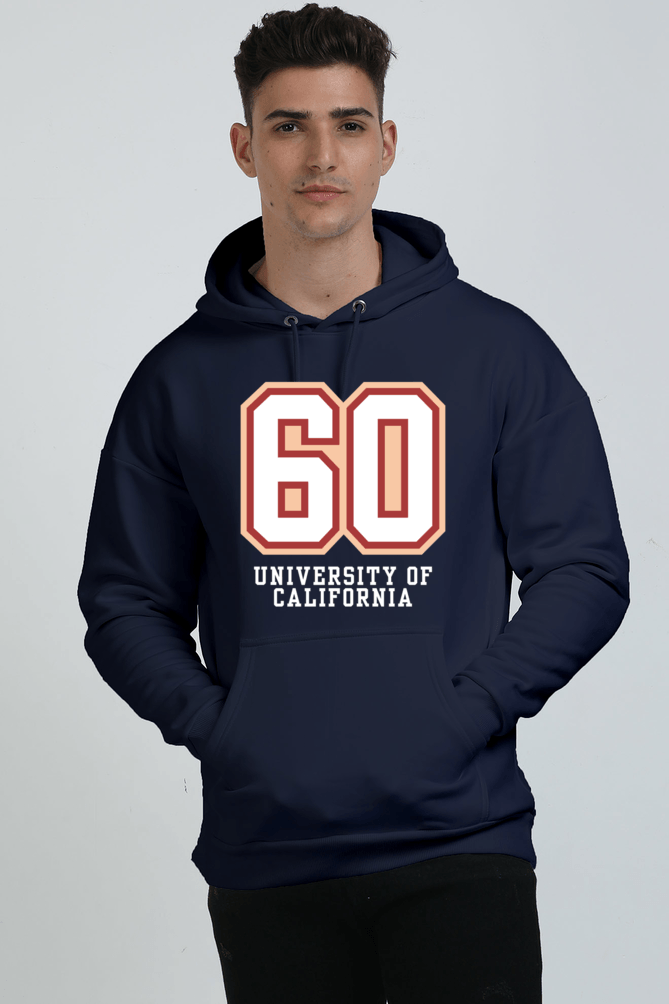 A person in a stylish heavyweight navy blue hoodie, featuring 60 and University of California on the front, stands confidently against a plain background. They gaze at the camera with hands casually in their pockets. A person in a stylish heavyweight navy blue hoodie, featuring 60 and University of California on the front, stands confidently against a plain background. They gaze at the camera with hands casually in their pockets.