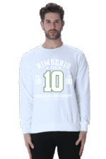 A person is wearing a unisex Rimberio sweatshirt that says Rimberio USA, Established 1990, Borcelle University, Varsity Team with the number 10 in green. Their hair is styled as they stand against a white background. Product Name: White.